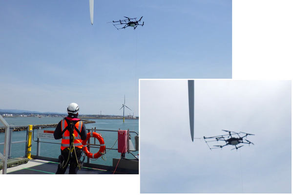 写真：飛行するドローン、ブレードの先端に接近するドローン